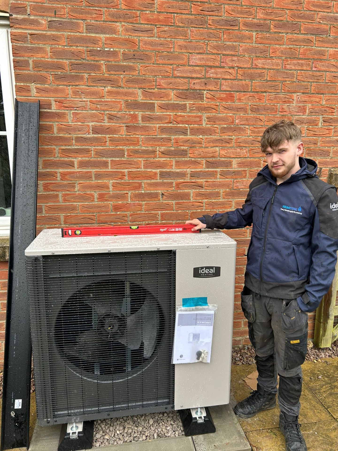 A Reactive engineer commissioning a heat pump installation in Northamptonshire